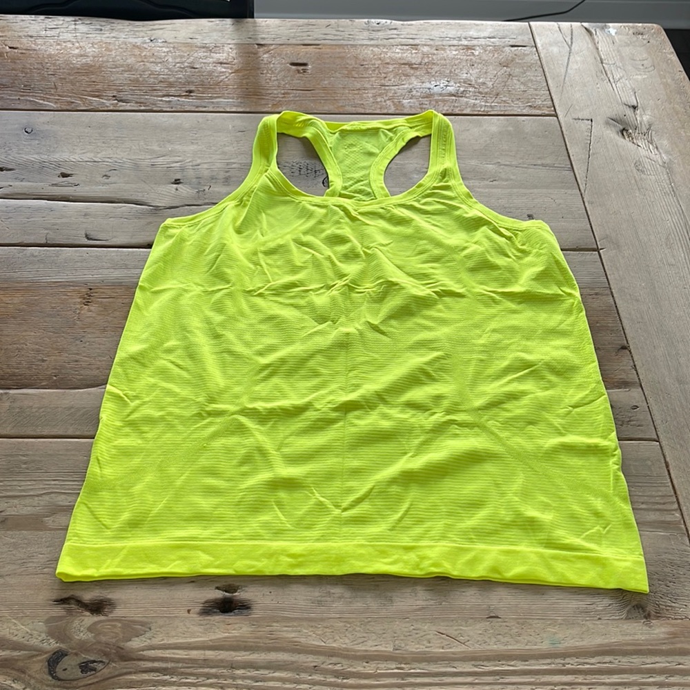 Lululemon swiftly tech tank top. Regular length. Size 10. Highlighter ye…
